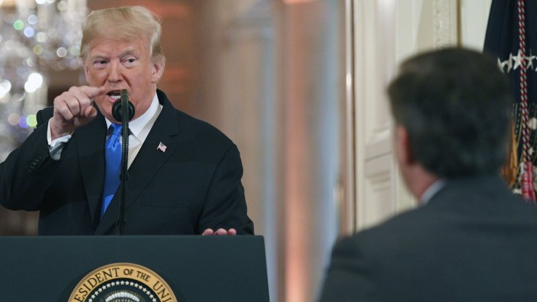 Le président Donald Trump et Jim Acosta