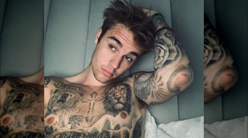 Les tatouages ​​de remplissage de Justin Bieber