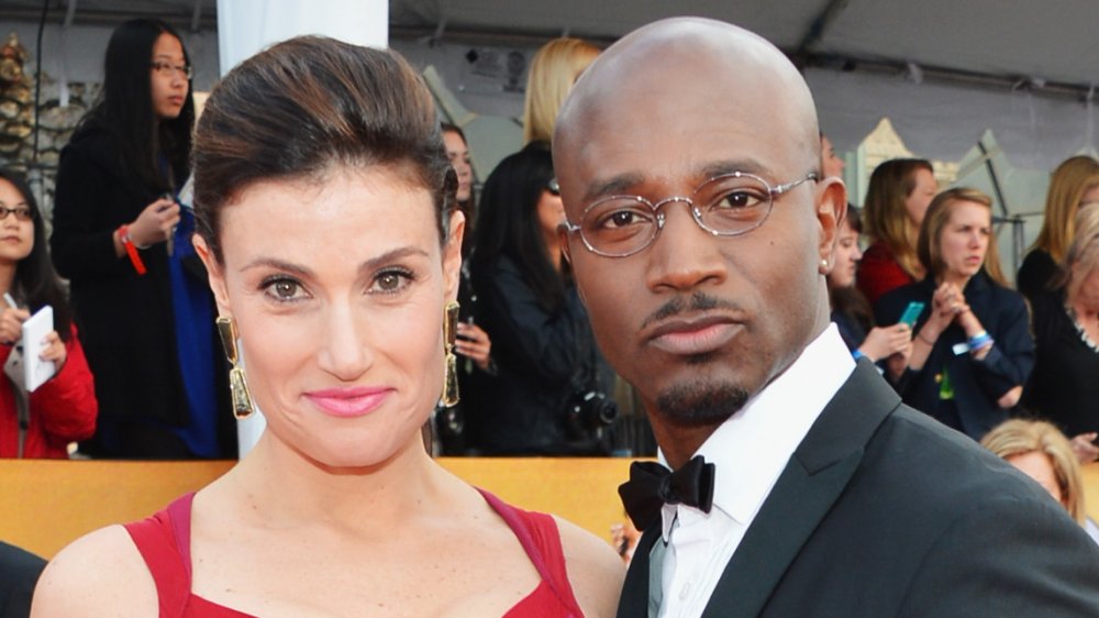 Idina Menzel et Taye Diggs sur un tapis rouge