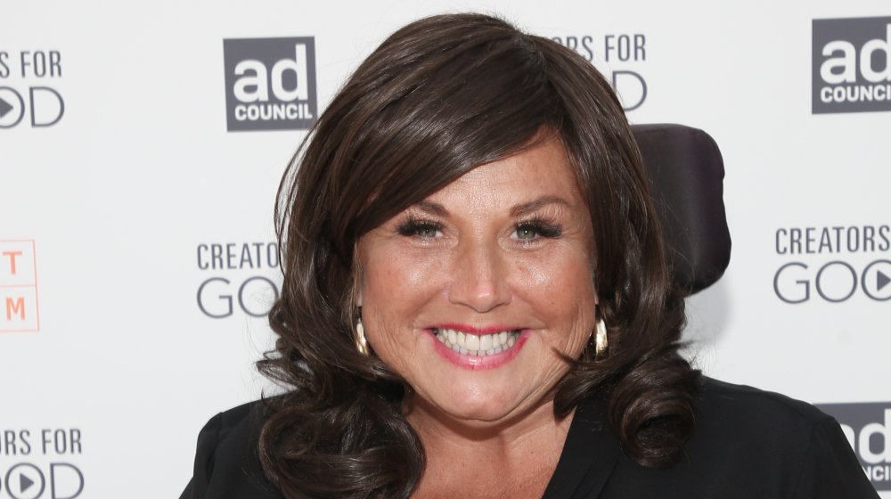 Abby Lee Miller souriant à la caméra