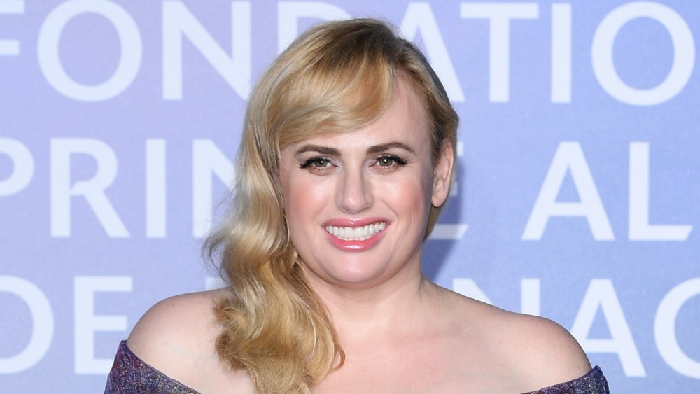 Rebel Wilson smiling at event