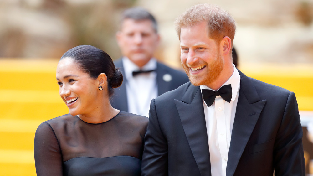 Meghan Markle et le prince Harry souriant