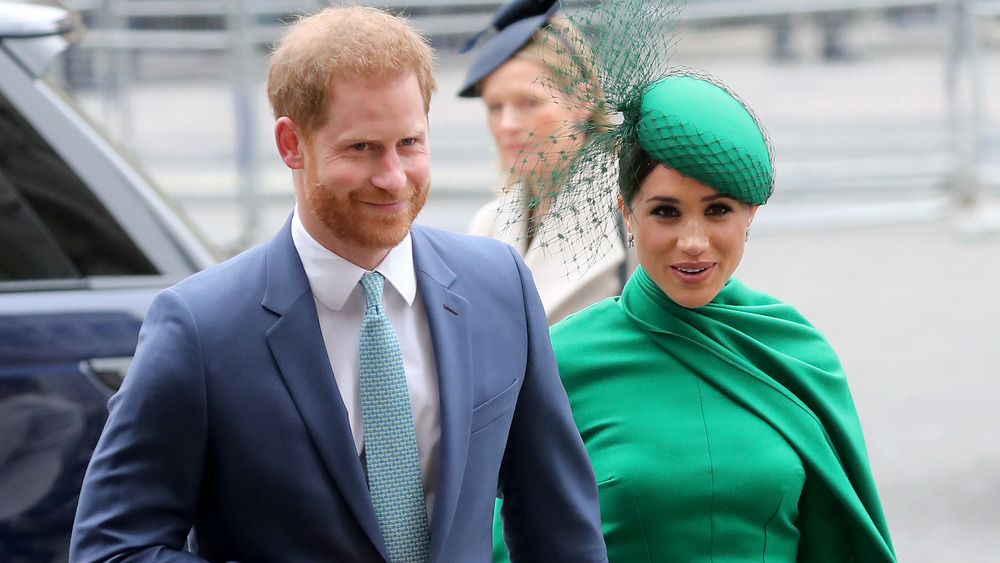 Le prince Harry et Meghan Markle marchent main dans la main