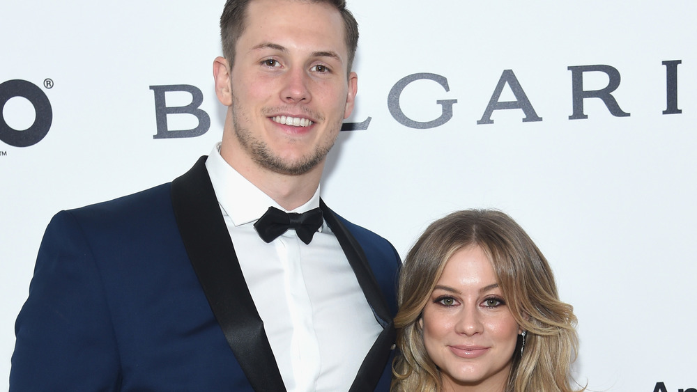 Shawn Johnson et Andrew East sur un tapis rouge