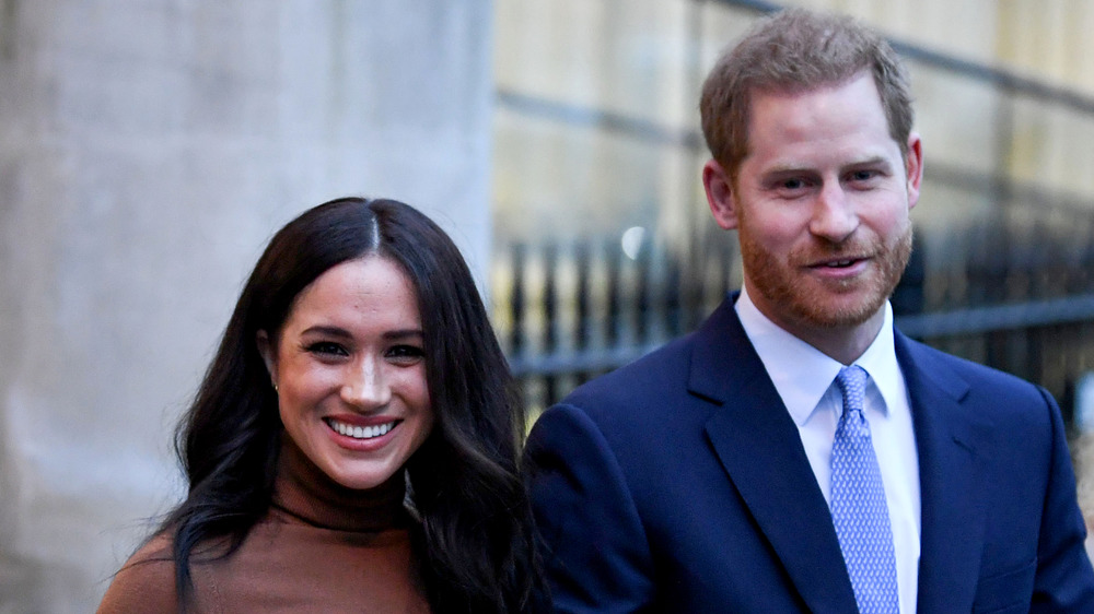 Prince Harry et Meghan Markle souriant