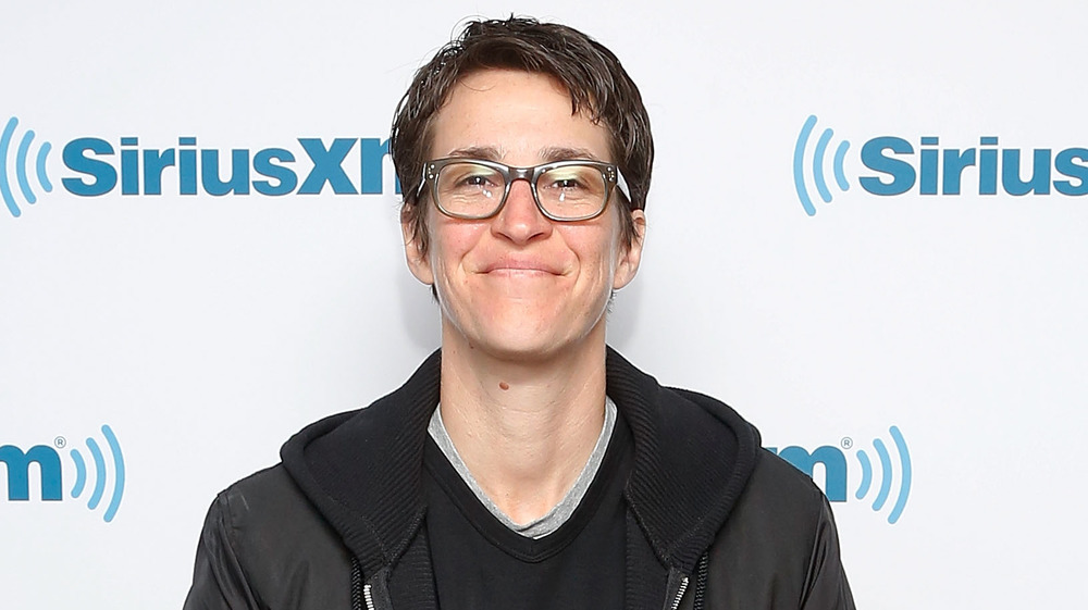 Rachel Maddow souriant