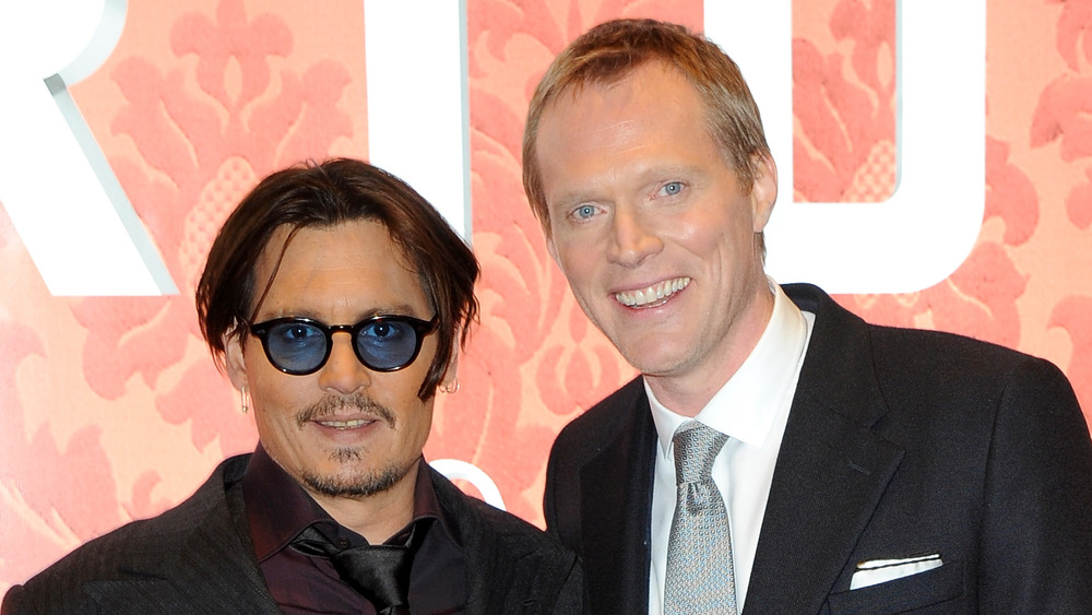 Johnny Depp et Paul Bettany souriant