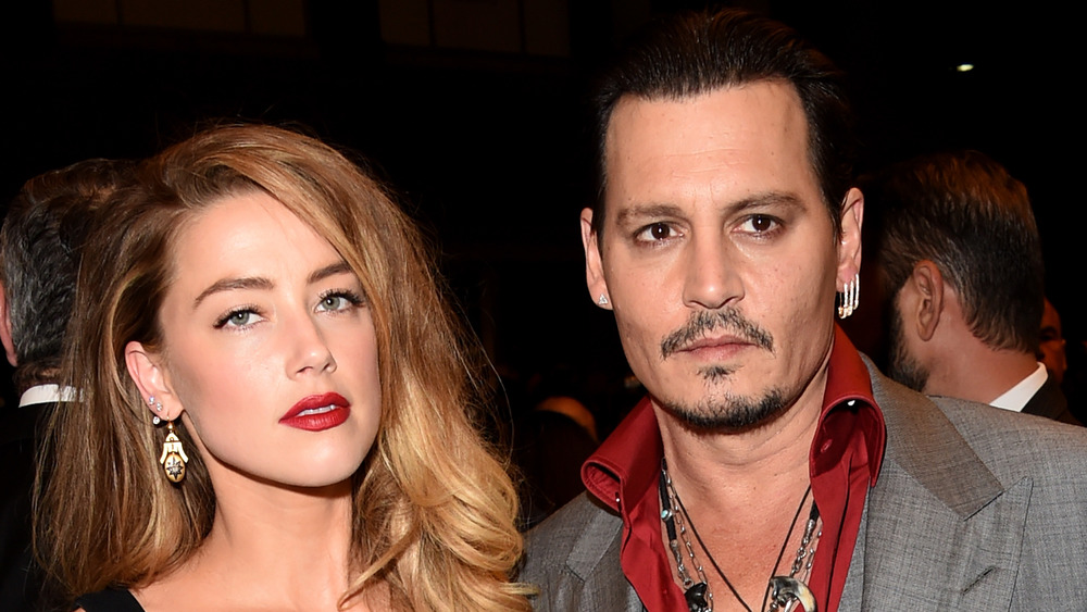 Amber Heard et Johnny Depp lors d'un événement