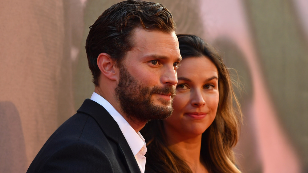 Amelia Warner et Jamie Dornan souriant