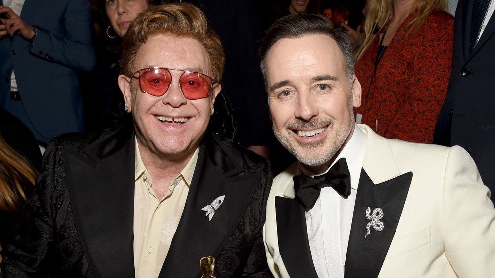 Elton John et David Furnish souriant