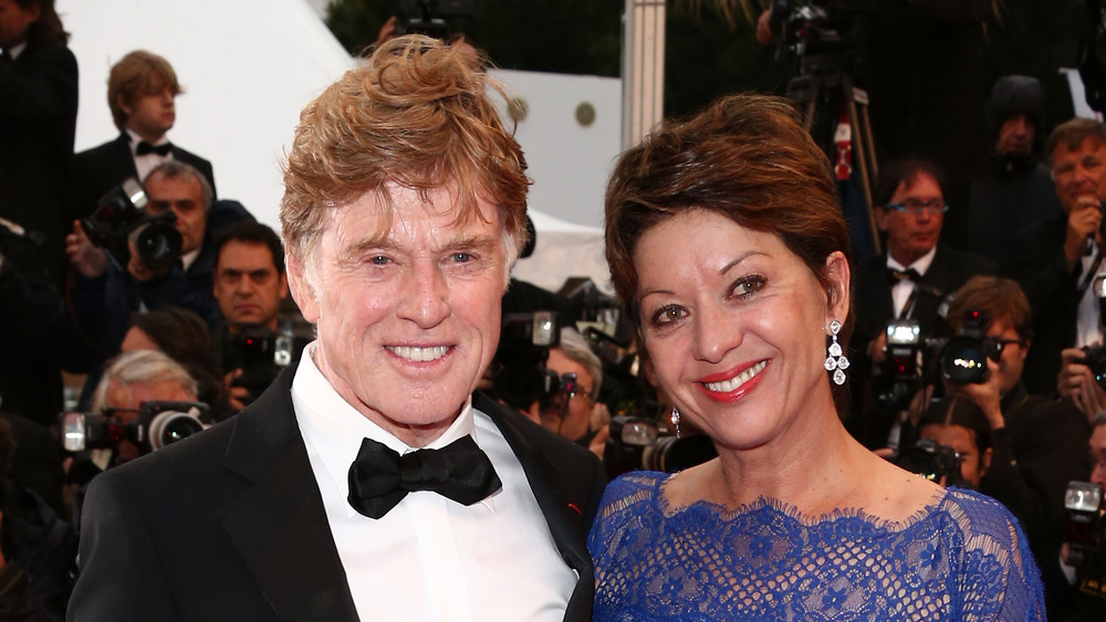 Robert Redford et Sibylle Szaggars souriant