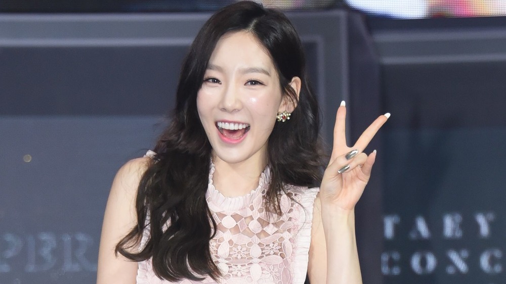 Taeyeon lors d'une conférence de presse en 2017