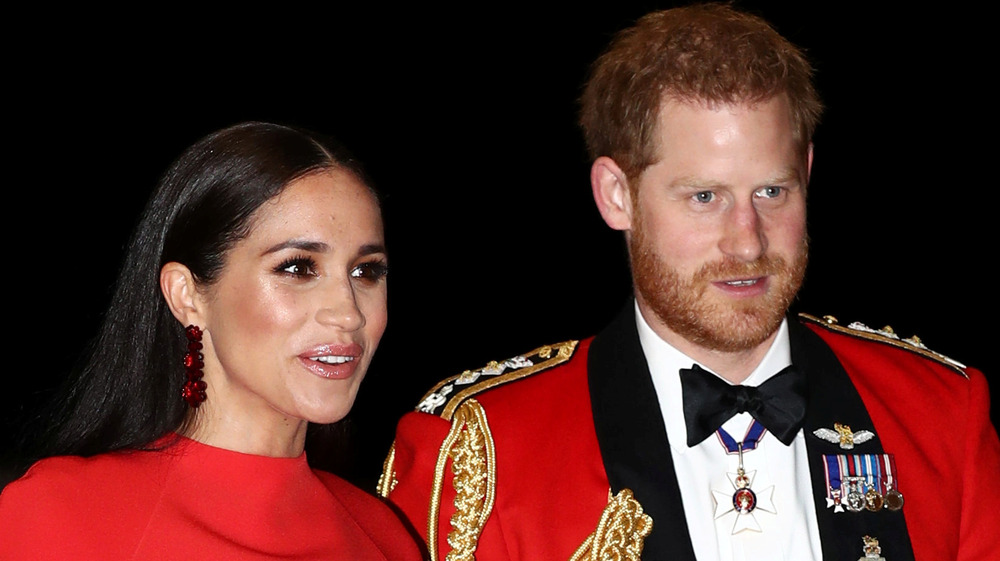 Meghan Markle et le prince Harry souriant