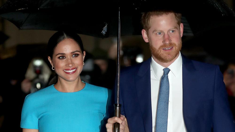 Meghan Markle et le prince Harry souriant