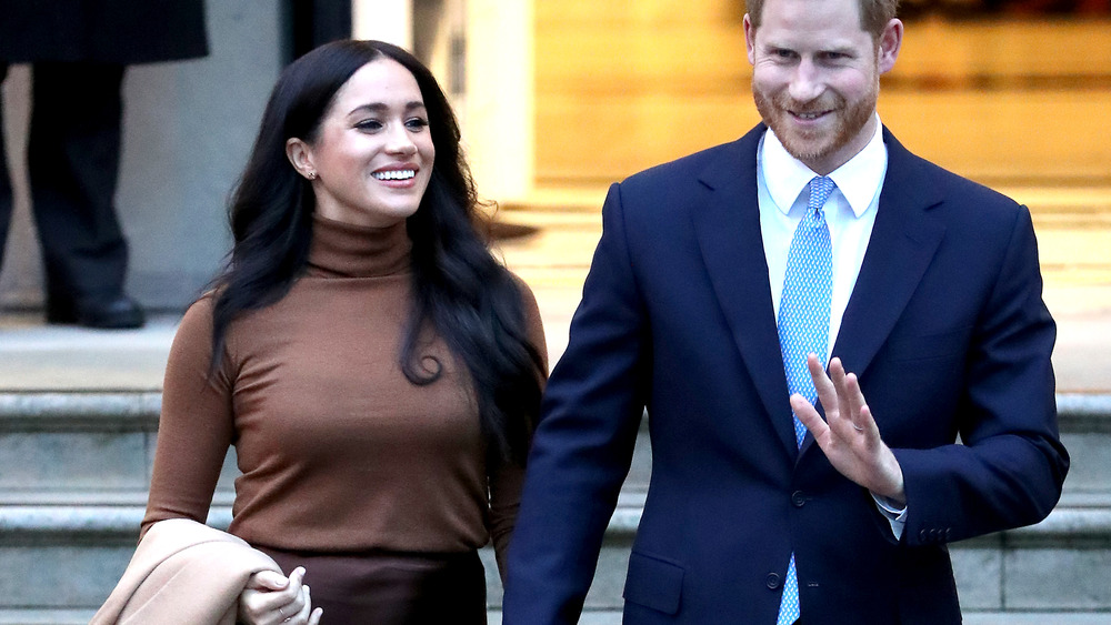 Meghan Markle et le prince Harry marchant