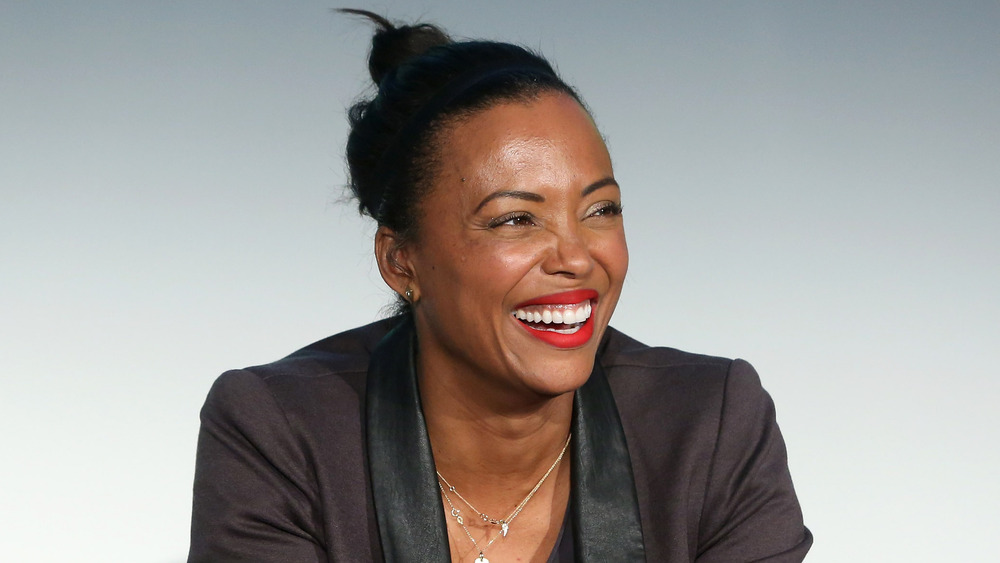 Aisha Tyler sur un panneau