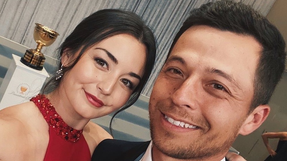 Xander Schauffele et Maya Lowe prenant un selfie