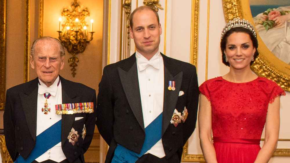 Le prince Philip, le prince William et Kate Middleton posent