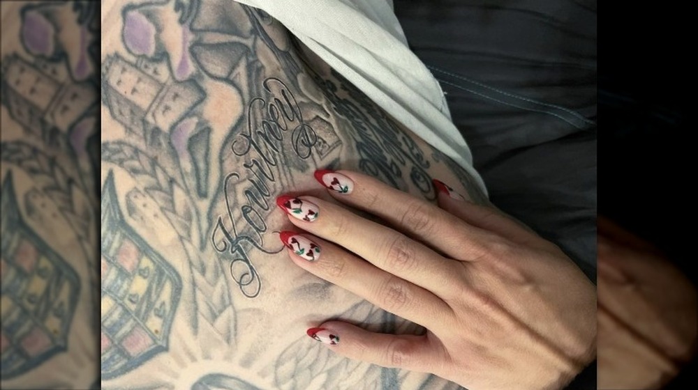 Le tatouage `` Kourtney '' de Travis Barker