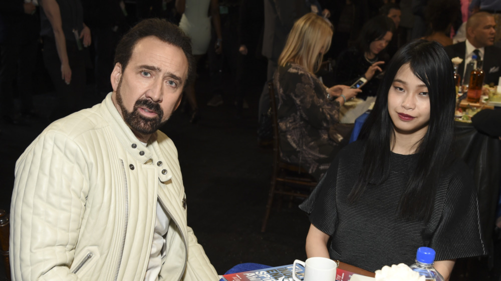 Nick Cage et Riko Shibata lors d'un événement