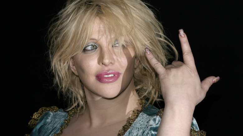 Signe de rock and roll de Courtney Love 