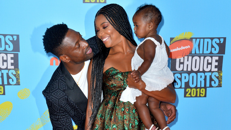 Gabrielle Union et Dwyane Wade avec sa fille Kaavia