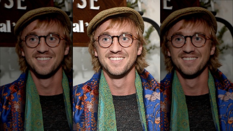 Tom Felton souriant