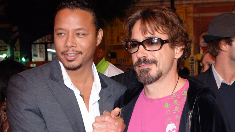 Terrence Howard et Robert Downey Jr souriant