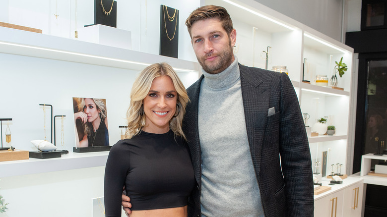 Kristin Cavallari et Jay Cutler souriant au magasin Uncommon James