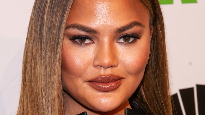 Les célébrités réagissent aux DM cruels de Chrissy Teigen au projet Michael Costello de Runway