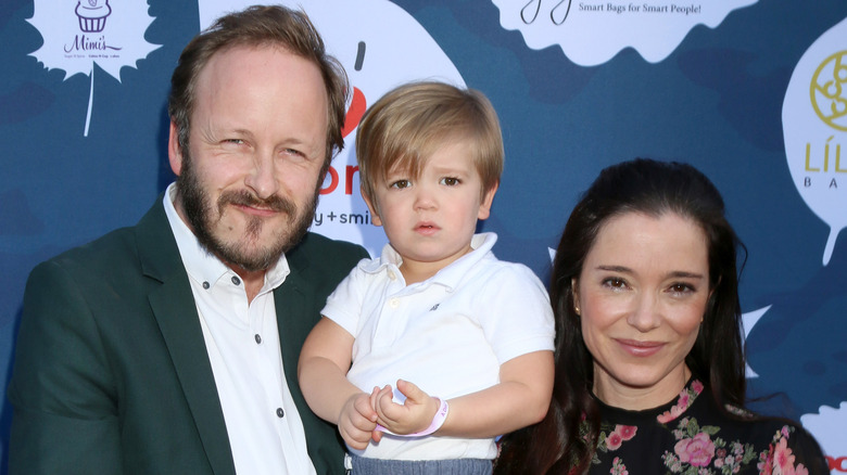 Christopher Redman et Marguerite Moreau posant avec leur fils