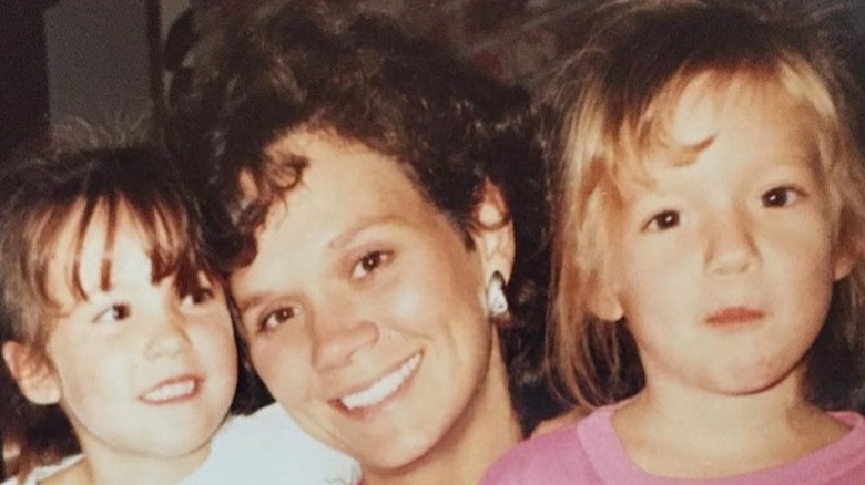 Megan Rapinoe avec maman Denise et sa soeur jumelle Rachael