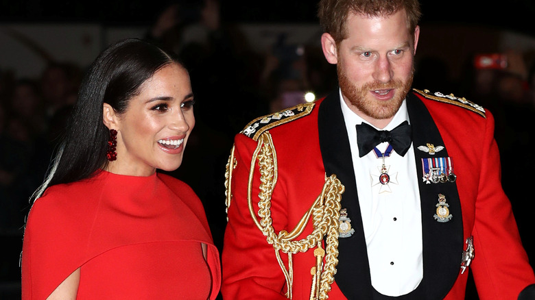 Meghan Markle et le prince Harry souriant