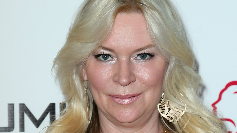 Jackie Siegel posant le tapis rouge