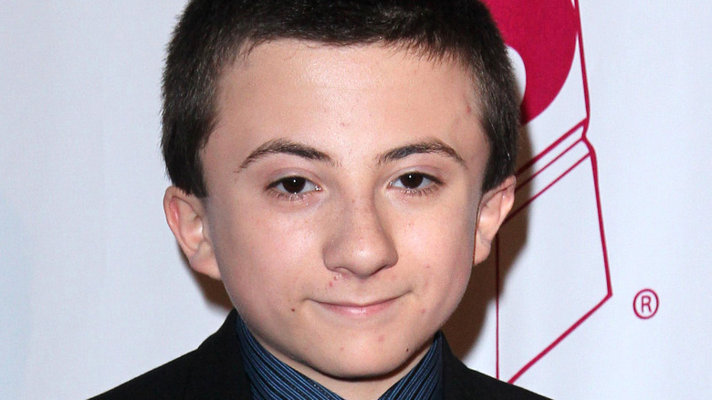 Atticus Shaffer smiling 