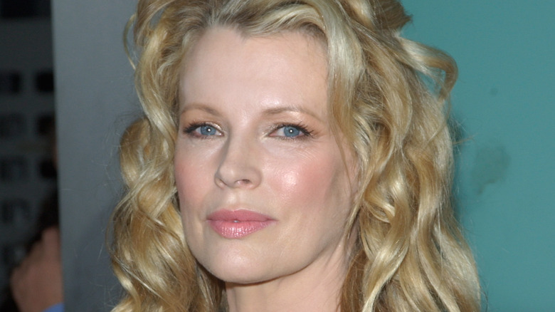 Kim Basinger smiling subtly 