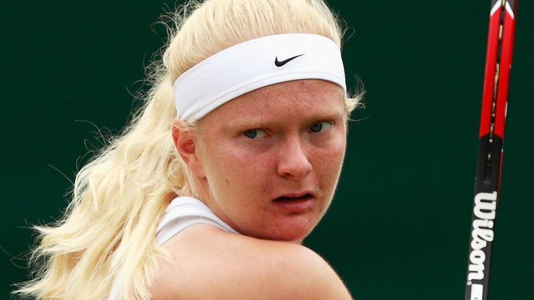 Francesca Jones playing tennis 