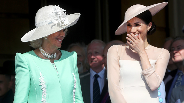 Camilla Parker Bowles et Meghan Markle