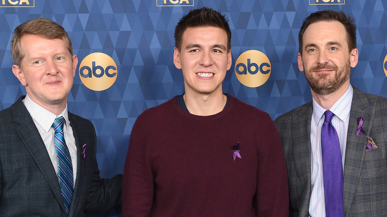 Ken Jennings, James Holzhauer, Brad Rutter posant