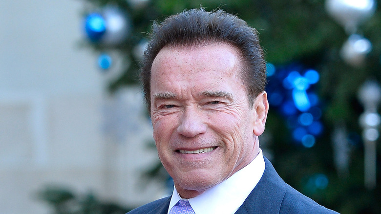 Arnold Schwarzenegger souriant