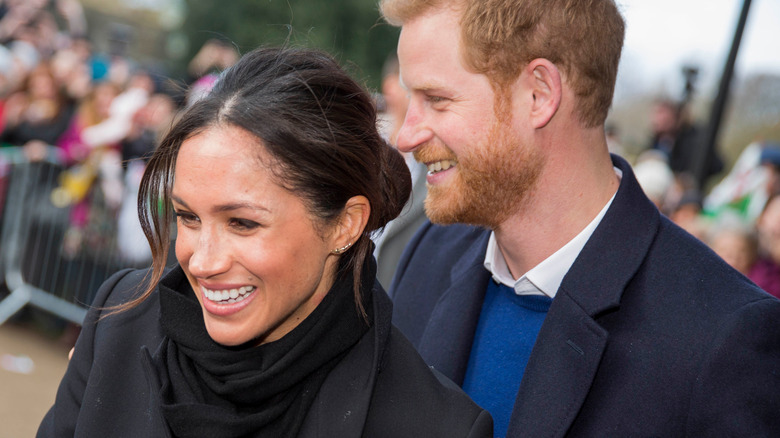 Le prince Harry, Meghan Markle en train de rire