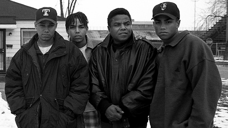 Tito Jackson and 3T in a group photo