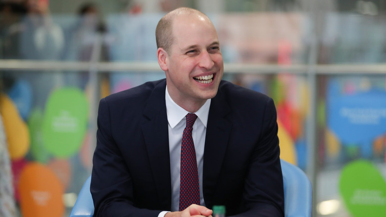 Prince William souriant