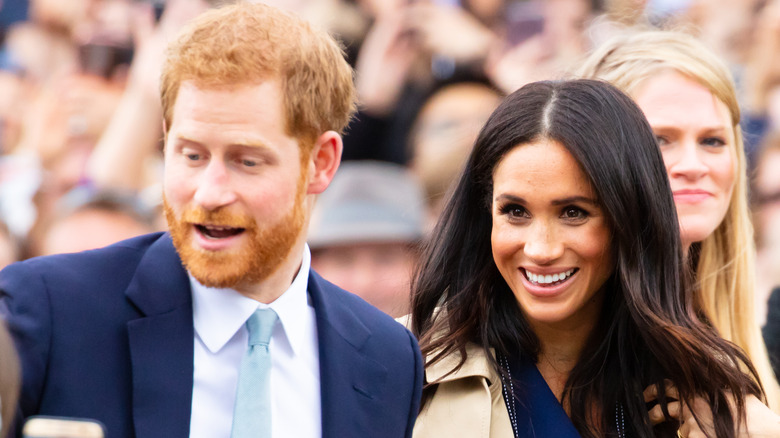 Le prince Harry et Meghan Markle discutent