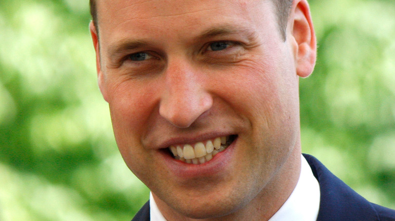 Prince William souriant