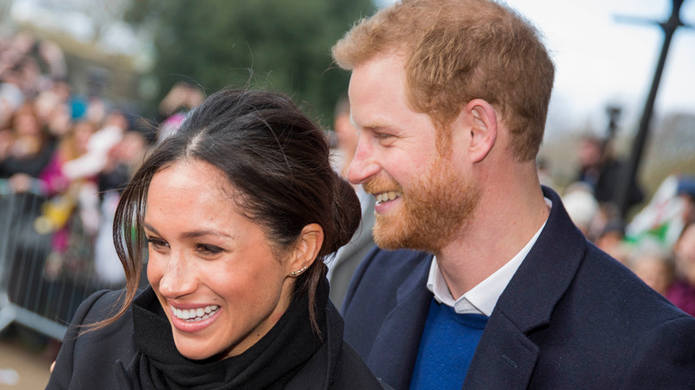 Meghan Markle et le prince Harry sourient