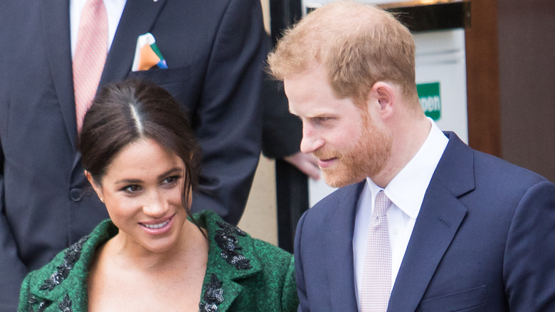 Meghan Markle, le prince Harry souriant