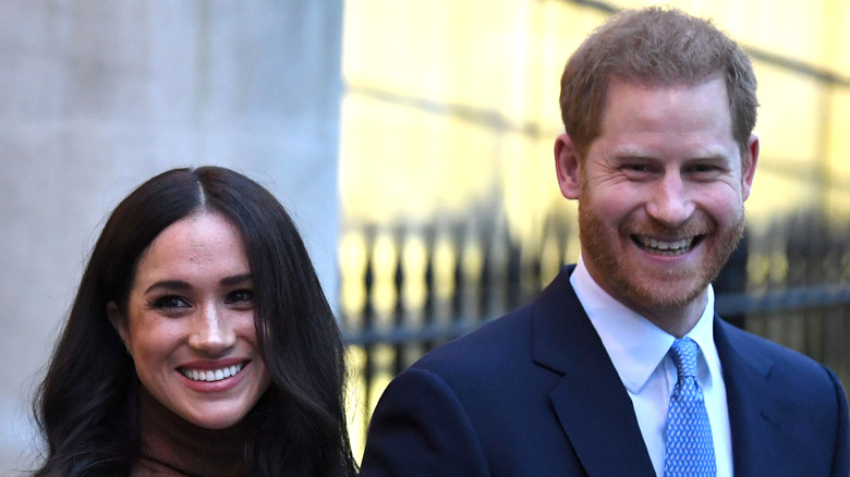 Meghan Markle, le prince Harry souriant