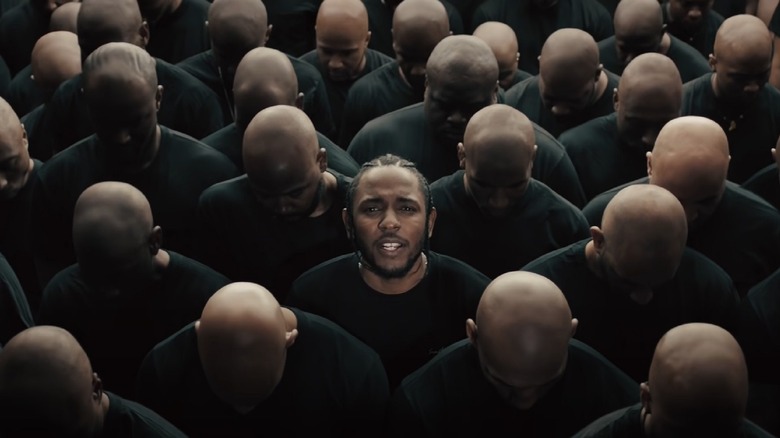 Kendrick Lamar dans un groupe