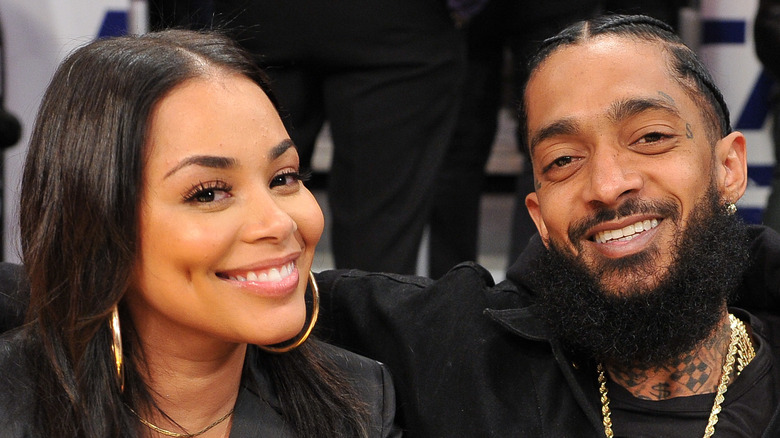 Lauren London et Nipsey Hussle lors d'un match de basket 